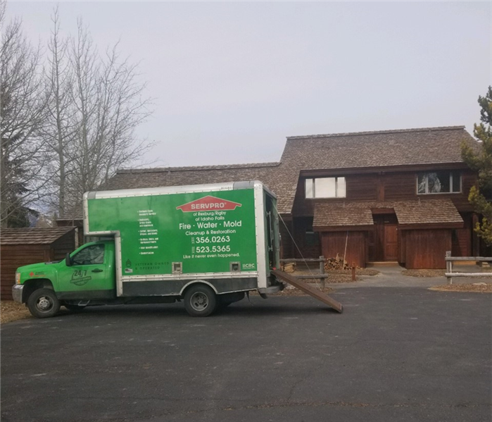 SERVPRO truck in front of house